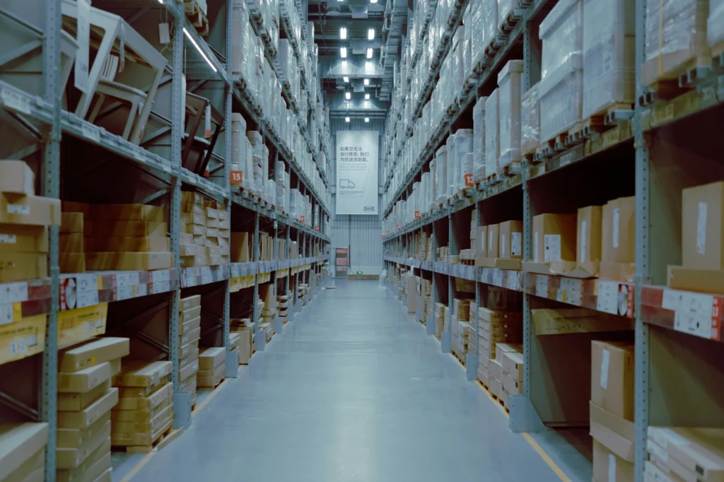 A large warehouse with racks full of products